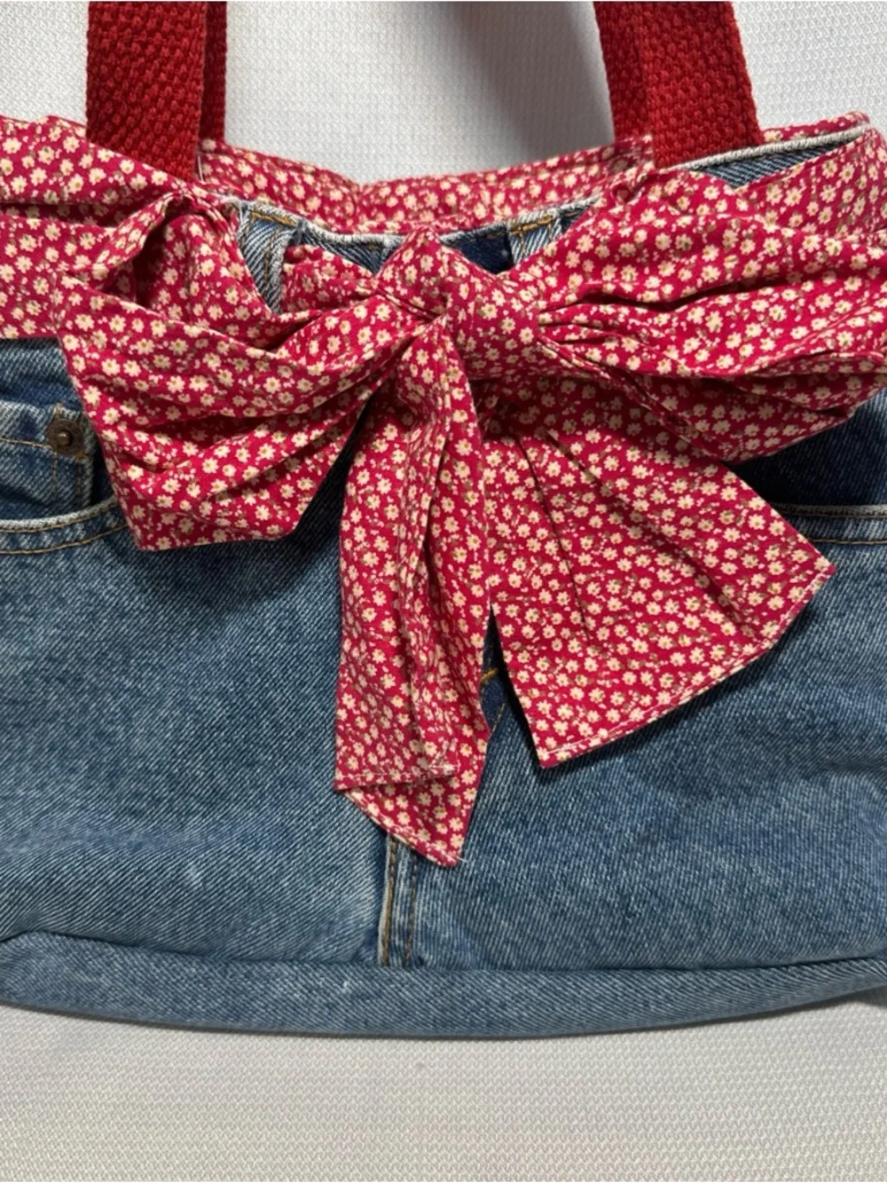 Levi's Denim Shoulder Bag with Red Floral Bow and Red Straps - Picture 2 of 7